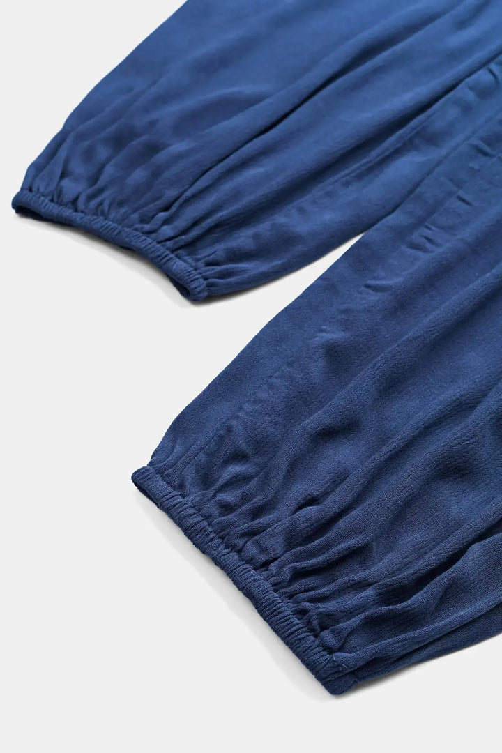 Hanah | Women’s halter jumpsuit with deep v neckline and pockets