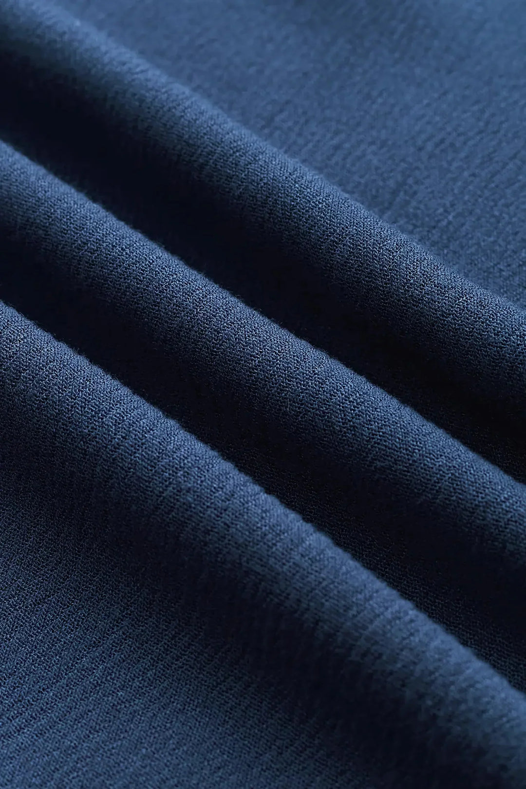 Hanah | Women’s halter jumpsuit with deep v neckline and pockets