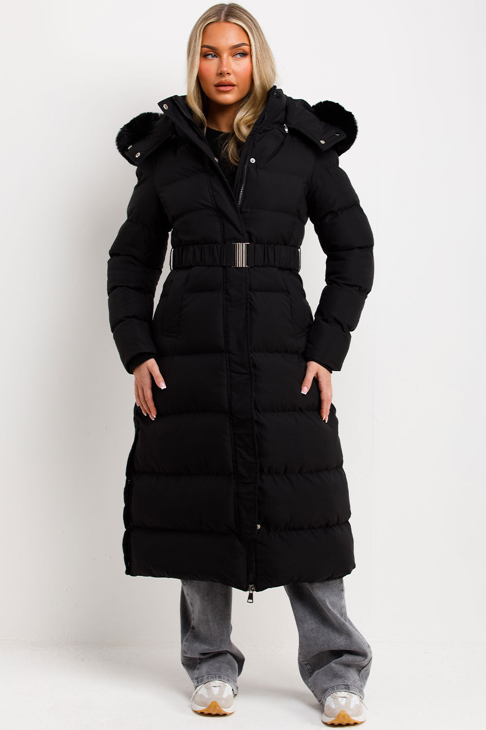 Corinne | Long puffer coat with faux fur hood and belt