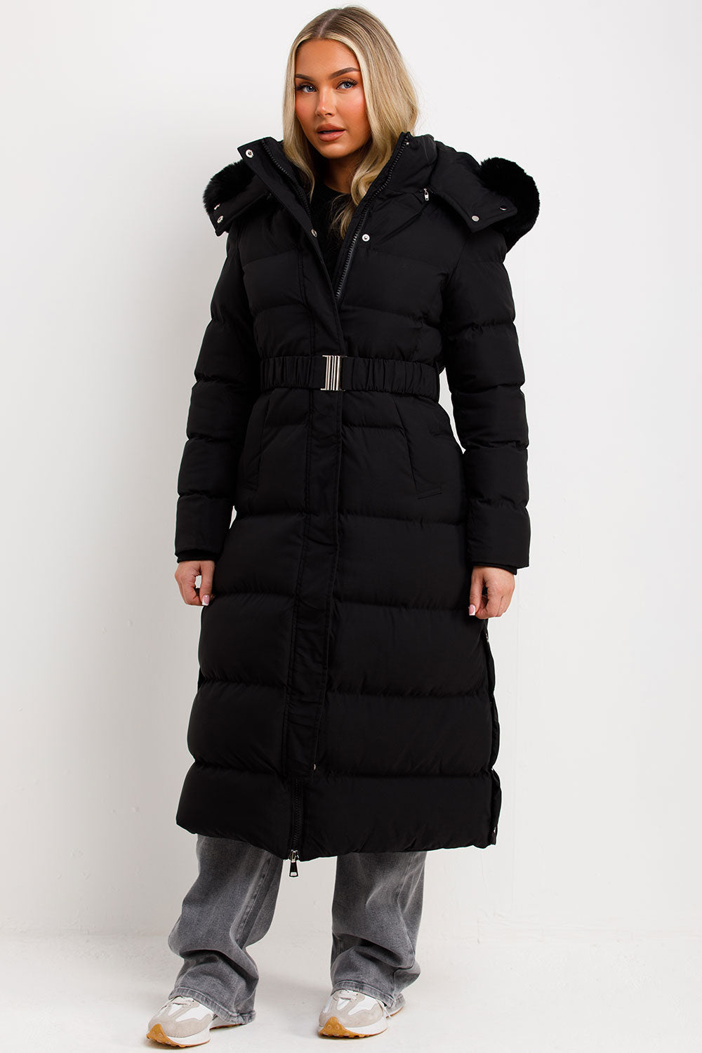 Corinne | Long puffer coat with faux fur hood and belt