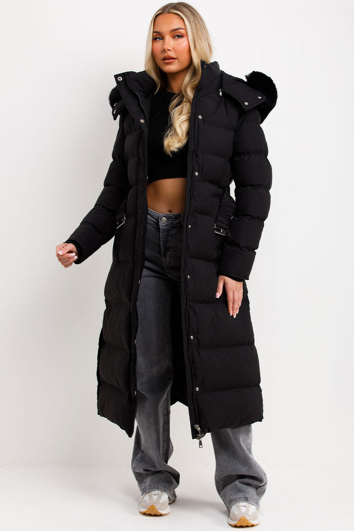 Corinne | Long puffer coat with faux fur hood and belt