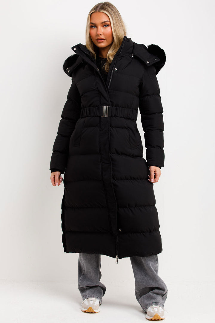 Corinne | Long puffer coat with faux fur hood and belt