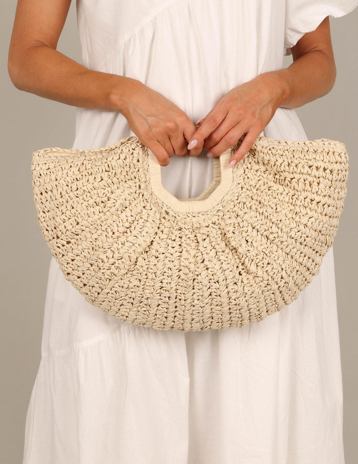 Dani | Women’s woven half-moon straw handbag