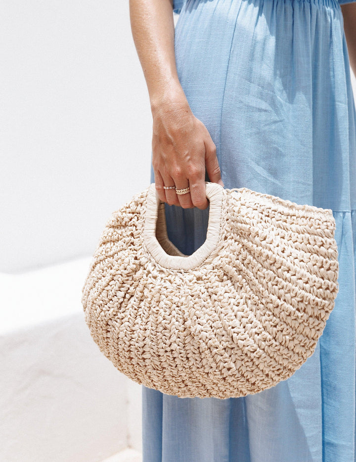 Dani | Women’s woven half-moon straw handbag