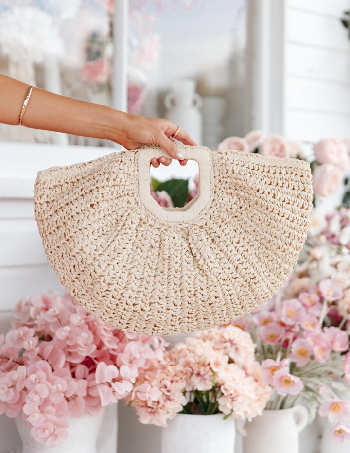 Dani | Women’s woven half-moon straw handbag