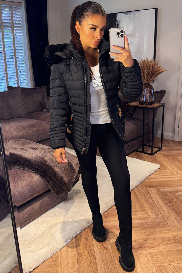 Malina | Women’s belted puffer jacket with faux fur hood