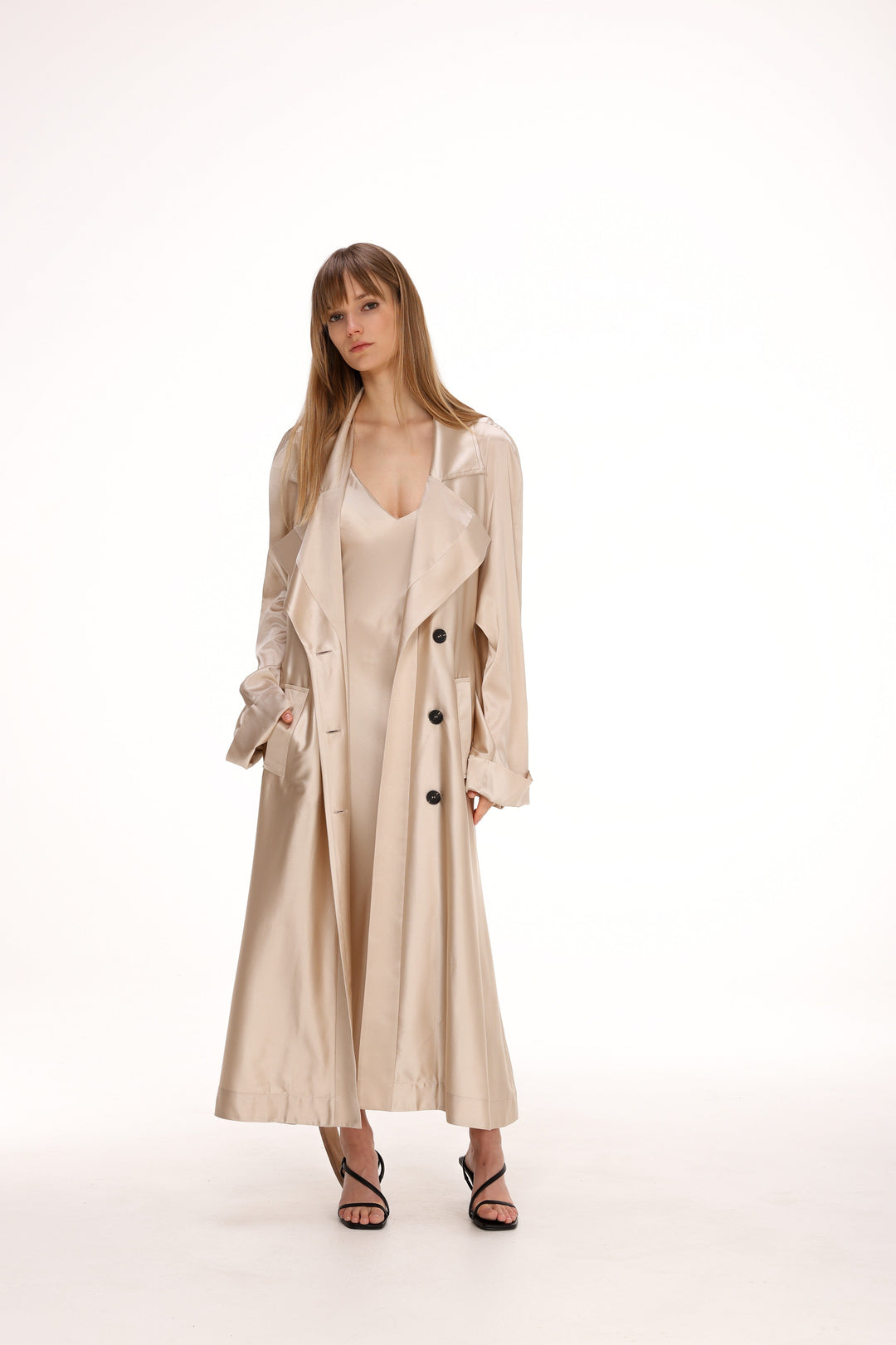 Tanya | Women’s long trench coat with flowing silhouette and button detail