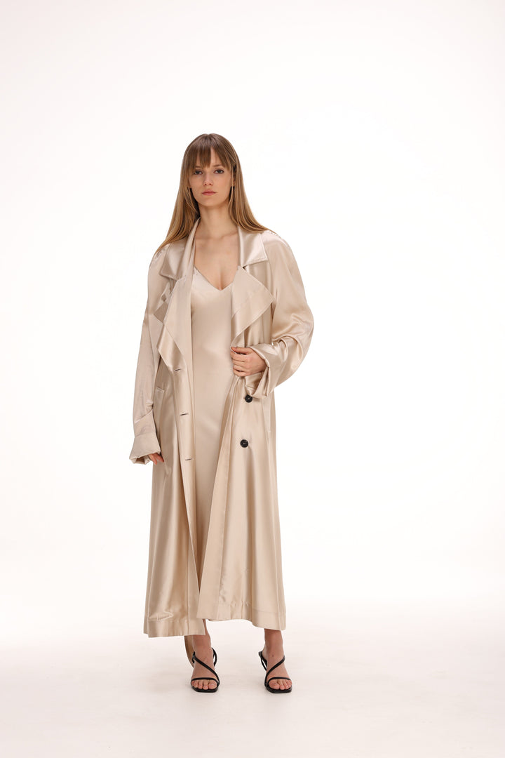 Tanya | Women’s long trench coat with flowing silhouette and button detail