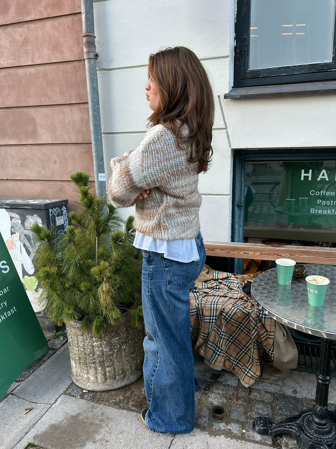 June | Women’s knit sweater with striped design