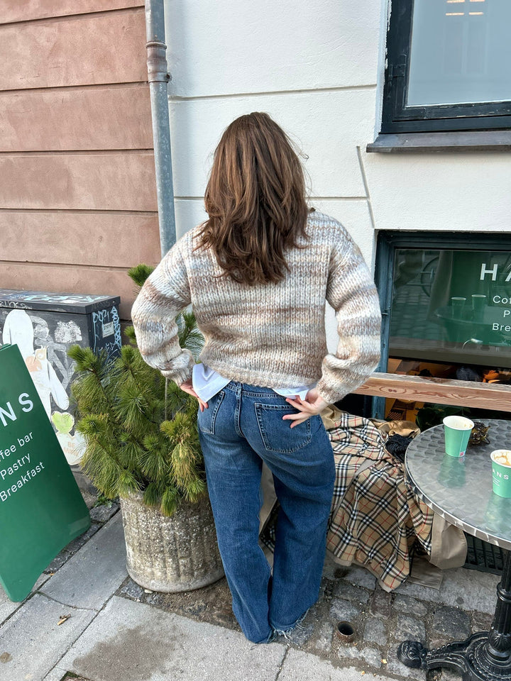 June | Women’s knit sweater with striped design