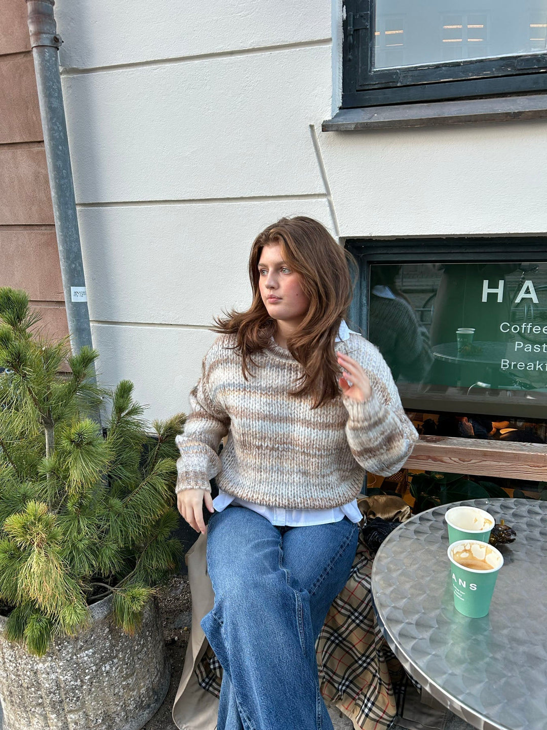 June | Women’s knit sweater with striped design