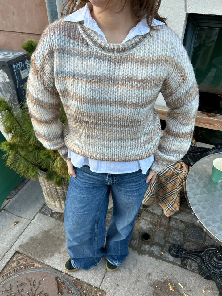 June | Women’s knit sweater with striped design