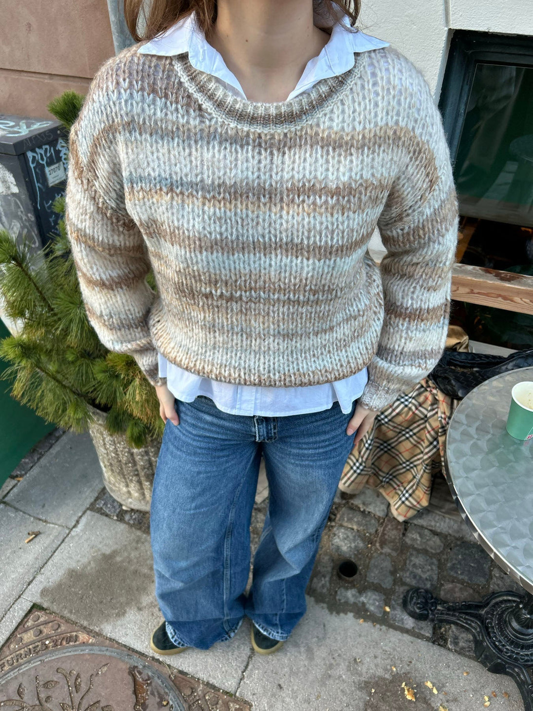 June | Women’s knit sweater with striped design