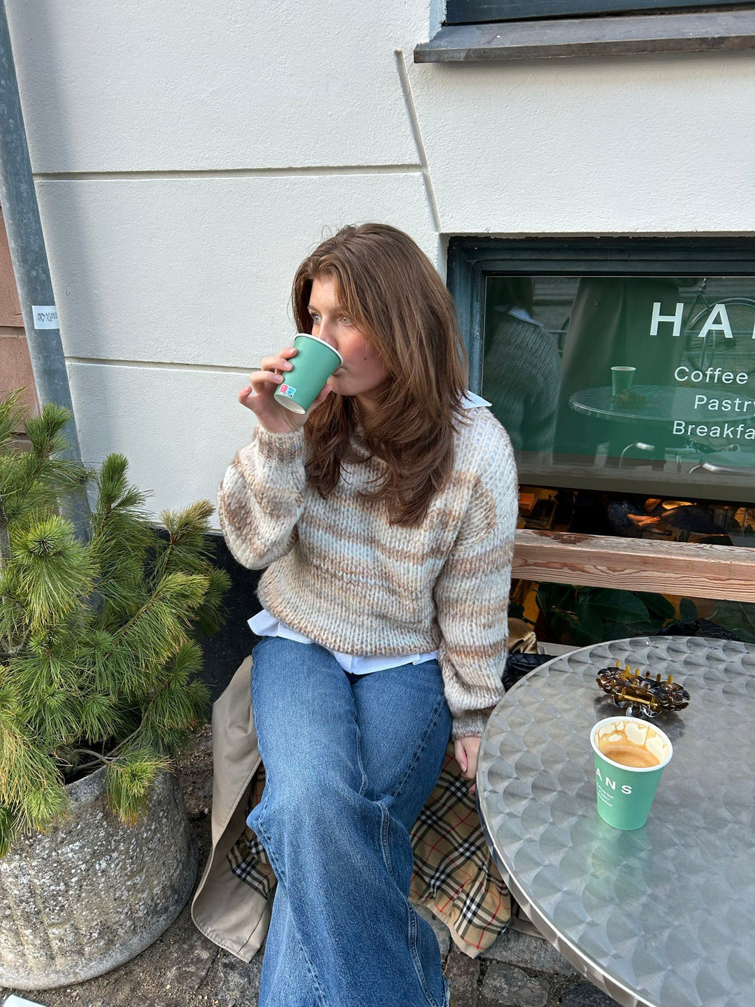 June | Women’s knit sweater with striped design