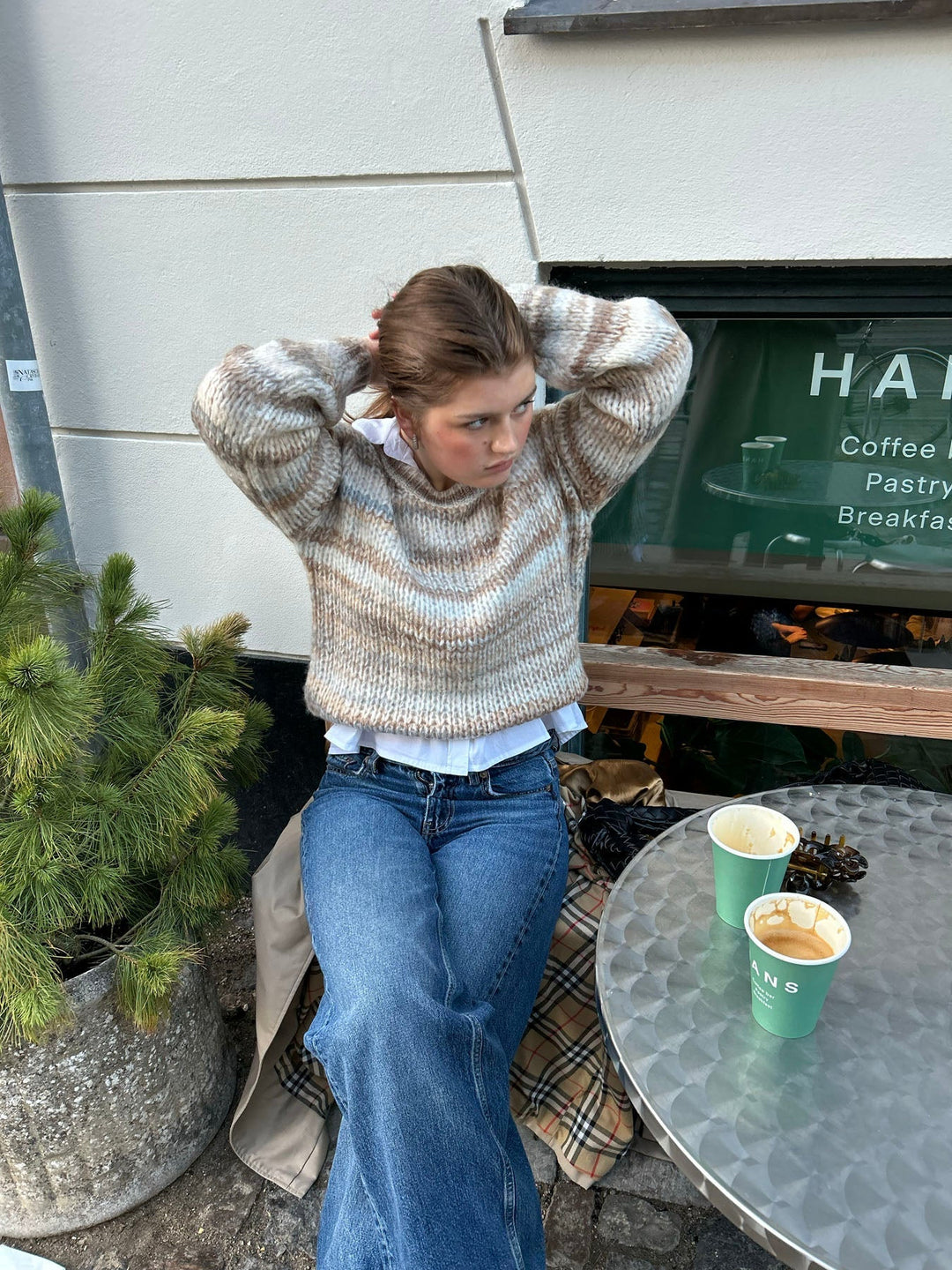 June | Women’s knit sweater with striped design