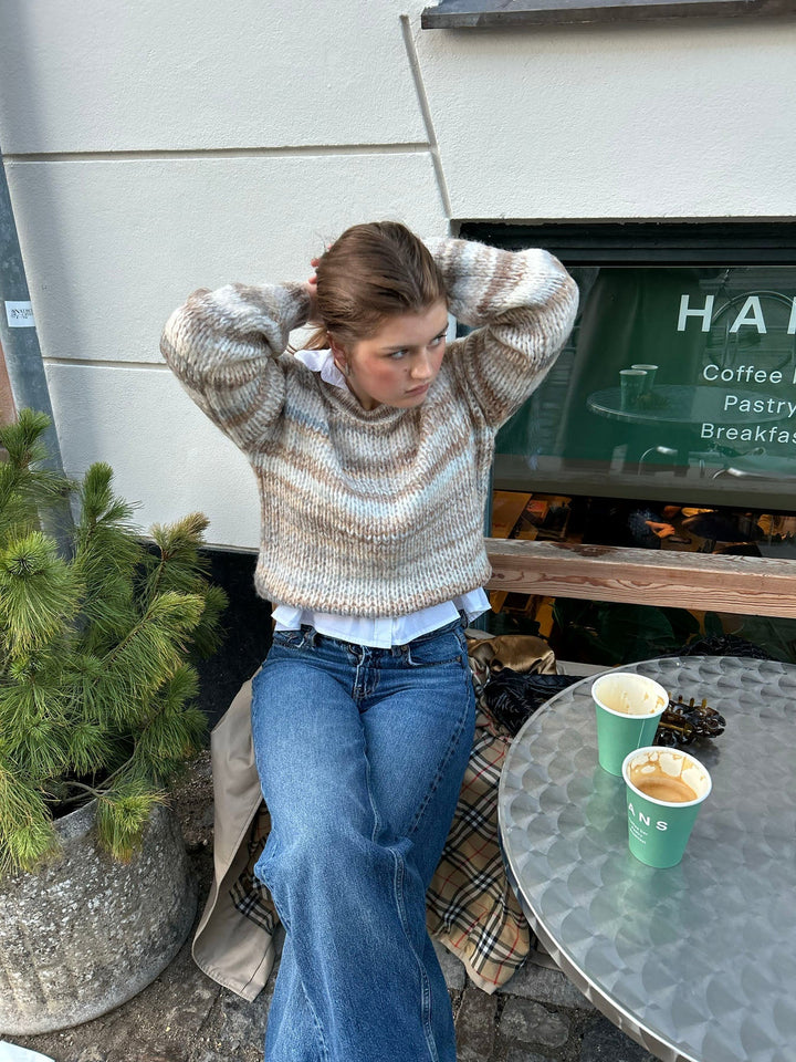 June | Women’s knit sweater with striped design