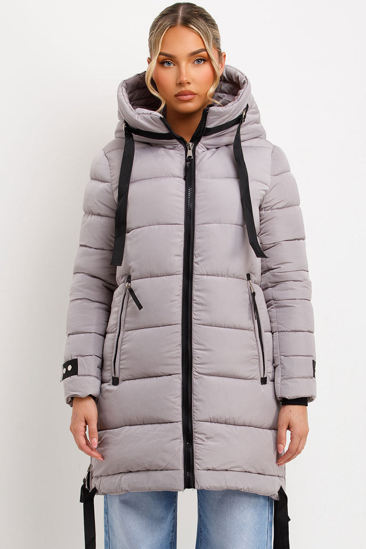 Ambriah | Women’s long puffer coat with hood and side straps