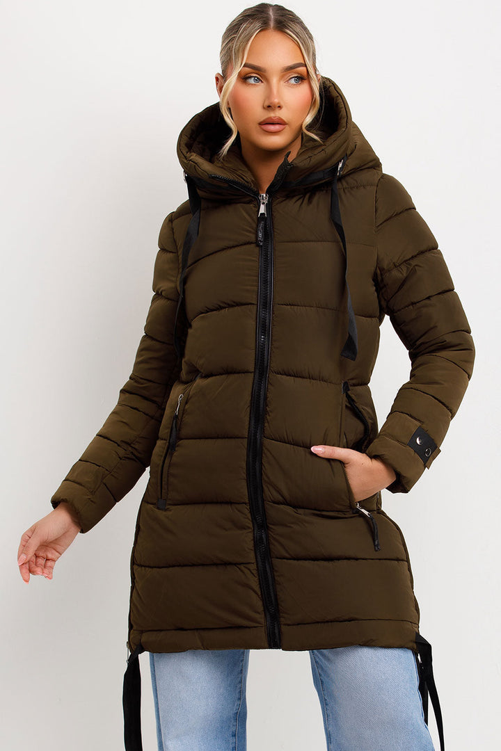 Kaeli | Women’s long puffer coat with hood and side straps